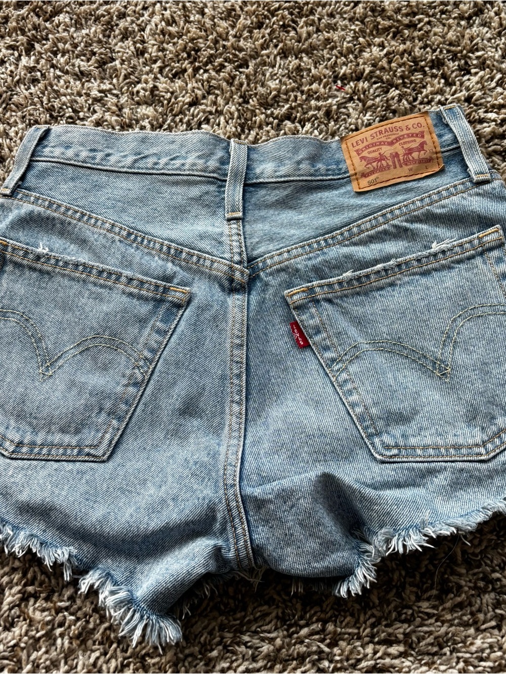 Levi's Light Blue Denim Cutoff Shorts with Frayed Hem 501 light